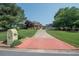 Charming home with a long driveway, well-manicured lawn, and inviting curb appeal at 105 Whippoorwill Way, Fayetteville, GA 30215