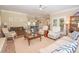 Open living space with view of kitchen, features neutral colors and tile floors at 105 Whippoorwill Way, Fayetteville, GA 30215
