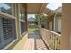 Exterior porch showcasing the side view of home, featuring windows, and decorative features at 105 Whippoorwill Way, Fayetteville, GA 30215