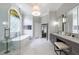 Luxurious bathroom with freestanding tub, glass-enclosed shower, and marble flooring at 2101 Hunters Green Dr, Lawrenceville, GA 30043