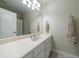 Bathroom with a large mirror, vanity with sink, and towel rack at 2101 Hunters Green Dr, Lawrenceville, GA 30043