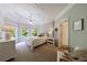 Inviting bedroom with tray ceiling, natural light, and a cozy atmosphere at 2101 Hunters Green Dr, Lawrenceville, GA 30043