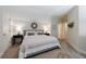 This is a bedroom with a large bed, two side tables, and two lamps at 2101 Hunters Green Dr, Lawrenceville, GA 30043