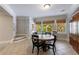 This finished basement features a dining area with a table and chairs at 2101 Hunters Green Dr, Lawrenceville, GA 30043