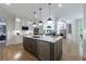 Kitchen island features a stainless steel dishwasher, sink and pendant lighting at 2101 Hunters Green Dr, Lawrenceville, GA 30043