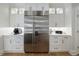 Kitchen featuring stainless steel refrigerator and white cabinets at 2101 Hunters Green Dr, Lawrenceville, GA 30043