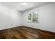 Bedroom with hardwood floors and window at 290 Dania Dr, Alpharetta, GA 30009