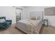 Bright and spacious bedroom with a queen-sized bed and ample natural light at 290 Dania Dr, Alpharetta, GA 30009