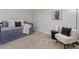 Bright bedroom featuring a daybed with plush pillows, chair, and stylish decor at 290 Dania Dr, Alpharetta, GA 30009