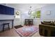 Inviting breakfast nook area filled with natural light and comfy seating at 290 Dania Dr, Alpharetta, GA 30009