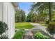 Professionally landscaped front yard with green lawn at 290 Dania Dr, Alpharetta, GA 30009