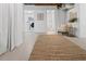 Hallway with laundry room and access to other rooms, natural rug at 290 Dania Dr, Alpharetta, GA 30009