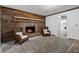 Inviting living room featuring brick fireplace, wood accents, and neutral decor at 290 Dania Dr, Alpharetta, GA 30009