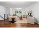 Inviting living room with hardwood floors, comfortable seating, and neutral color palette at 290 Dania Dr, Alpharetta, GA 30009