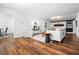 Spacious living room featuring wood floors and a fireplace, perfect for relaxation at 290 Dania Dr, Alpharetta, GA 30009