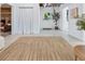 Open living space with neutral colored rug, fireplace, seating, and ample natural light at 290 Dania Dr, Alpharetta, GA 30009