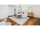 Bright bedroom with hardwood floors, neutral tones, and stylish furnishings at 290 Dania Dr, Alpharetta, GA 30009