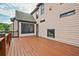 Large wooden deck, fireplace, and outdoor living, perfect for entertaining or relaxing outdoors at 6477 Blue Water Dr, Buford, GA 30518