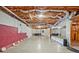 Unfinished basement with mirrored dance studio space and potential for customization at 6477 Blue Water Dr, Buford, GA 30518