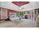 Spacious main bedroom with trey ceilings, fireplace, sitting area, and lots of natural light at 6477 Blue Water Dr, Buford, GA 30518