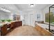 Beautiful bathroom with tiled floors, dual sinks, vanity, and soaking tub at 910 Ovalene Sw Ln, Marietta, GA 30064