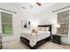 Cozy bedroom filled with natural light, features a comfortable bed and stylish decor at 910 Ovalene Sw Ln, Marietta, GA 30064