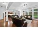 Bright living room with hardwood floors, open layout, and comfortable seating at 910 Ovalene Sw Ln, Marietta, GA 30064