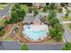 Community pool with lounge chairs, playground, and well-manicured landscaping at 910 Ovalene Sw Ln, Marietta, GA 30064