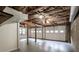 Unfinished basement with multiple garage doors, offering tons of customizable space at 3323 Lancing Ct, Duluth, GA 30096
