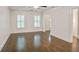 Spacious bedroom with hardwood floors, shutters, and recessed lighting at 3323 Lancing Ct, Duluth, GA 30096