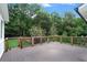Large wooden deck overlooking a wooded backyard at 3323 Lancing Ct, Duluth, GA 30096