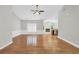 Open living space with hardwood floors, seamlessly flows into the kitchen and fireplace at 5600 Walnut Creek Nw Ct, Lilburn, GA 30047