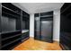 Large walk-in closet with modern shelving, drawers, and plenty of storage at 5600 Walnut Creek Nw Ct, Lilburn, GA 30047