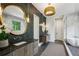 Stunning bathroom boasts dual vanities, freestanding tub and oversized shower with marble surround at 225 River Valley Ct, Atlanta, GA 30328