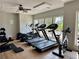 Well-equipped gym with treadmills, elliptical machines, spin bike, and free weights with ample lighting at 3693 Allegretto Cir, Atlanta, GA 30339