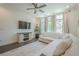Inviting living room featuring a comfortable sectional sofa and entertainment center at 3693 Allegretto Cir, Atlanta, GA 30339