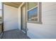 View of the sliding door and window from the patio, revealing the townhouse's exterior at 3693 Allegretto Cir, Atlanta, GA 30339