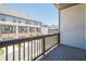 View of the street from a patio that looks out at neighboring townhomes in the community at 3693 Allegretto Cir, Atlanta, GA 30339