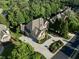 Expansive aerial view of home featuring circular driveway and meticulously kept landscaping at 8805 Marion Dr, Duluth, GA 30097