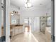 Elegant bathroom featuring a vanity with granite countertop and a glass-enclosed shower with a separate soaking tub at 8805 Marion Dr, Duluth, GA 30097