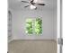 Spacious bedroom with neutral walls, a built-in shelf, and a large window at 8805 Marion Dr, Duluth, GA 30097