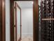 Hallway featuring a frosted glass paneled door and a decorative wine rack system at 8805 Marion Dr, Duluth, GA 30097