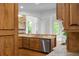 Spacious kitchen with custom cabinetry, granite countertops, stainless steel appliances, and hardwood floors at 8805 Marion Dr, Duluth, GA 30097