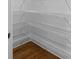 Walk-in pantry with wood floors and ample metal shelving at 8805 Marion Dr, Duluth, GA 30097