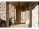 Covered porch with brick columns and flooring, offering a charming outdoor space at 8805 Marion Dr, Duluth, GA 30097