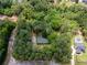 Aerial view of wooded 3.0 acre lot with home site and rough property lines at 5216 Wheeler Dr, Loganville, GA 30052
