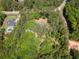 Aerial view of wooded 3.0 acre lot with home site, with rough property lines at 5216 Wheeler Dr, Loganville, GA 30052