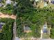 Aerial view of property featuring a wooded lot with lots of trees at 5216 Wheeler Dr, Loganville, GA 30052