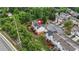 A high aerial shot shows the rear of a townhome with fenced decks and mature shade trees at 5989 Turfway Park Ct, Sugar Hill, GA 30518
