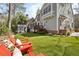 View of the backyard, patio, deck and screened-in porch at 735 Longwood Nw Dr, Atlanta, GA 30305